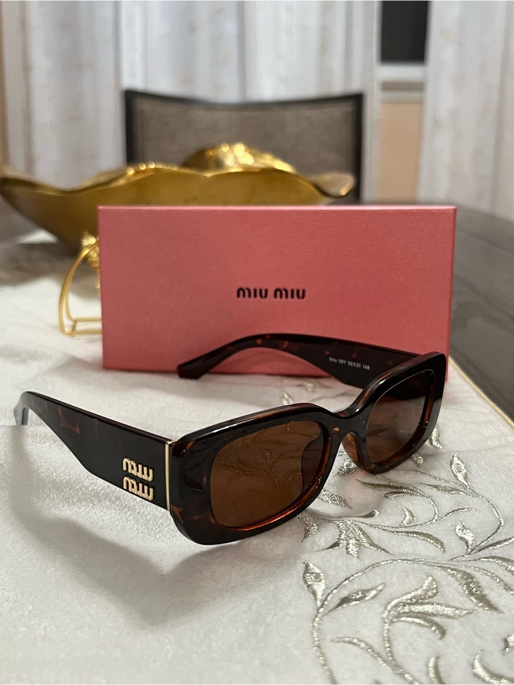 Miu Miu Tortoiseshell Sunglasses with Brown Lenses